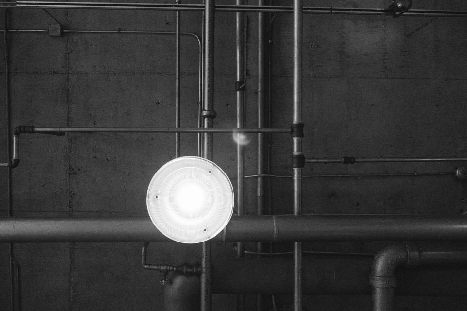 Exposed commercial piping in a mechanical room